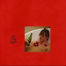 Red album cover with a small photo of someone in a bathtub
