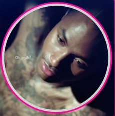 Album cover of a man framed by a pink ring